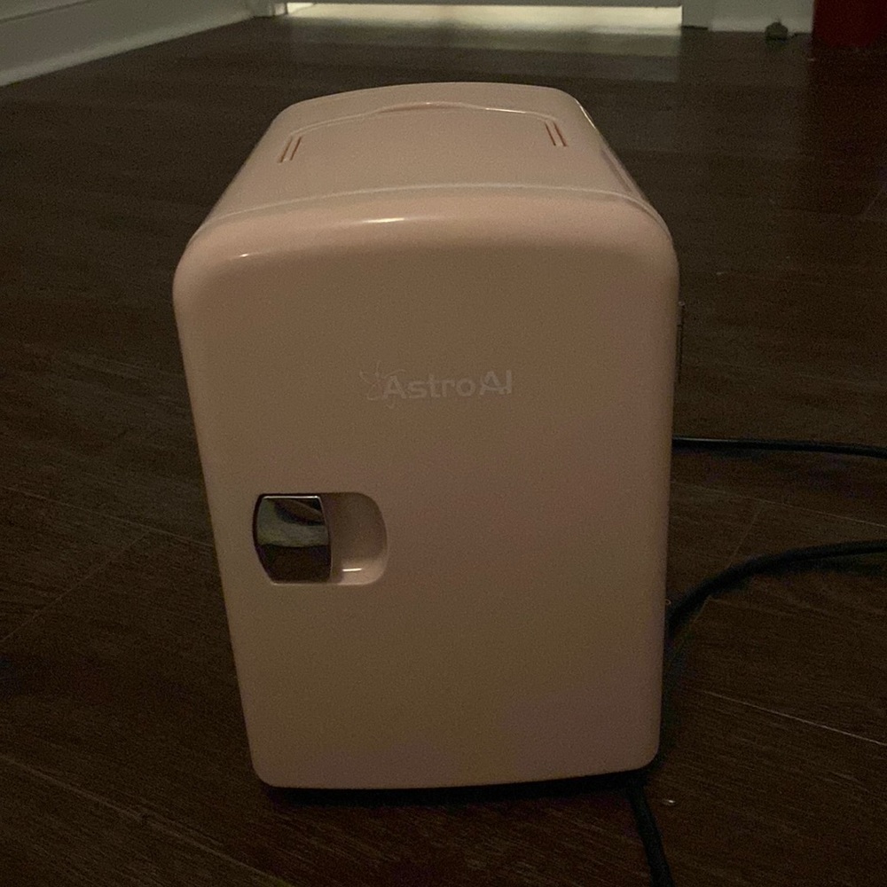 Pink mini fridge